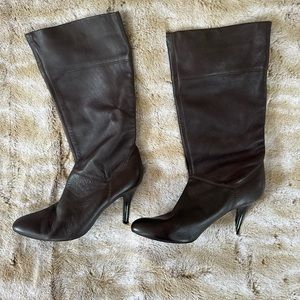 Slouchy leather, just below the knee boots.